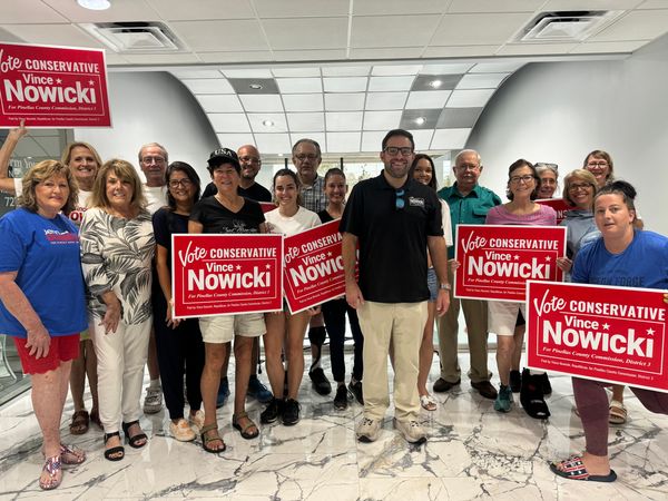 Commissioner Vince Nowicki with volunteers and supporters