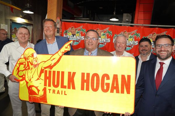 Commissioner Vince Nowicki at the Hulk Hogan Trail sign unveiling
