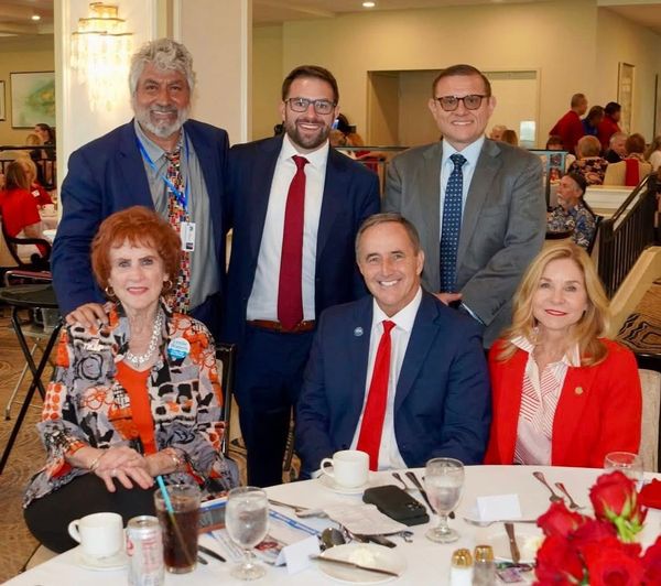 Commissioner Vince Nowicki with local elected leaders at a luncheon