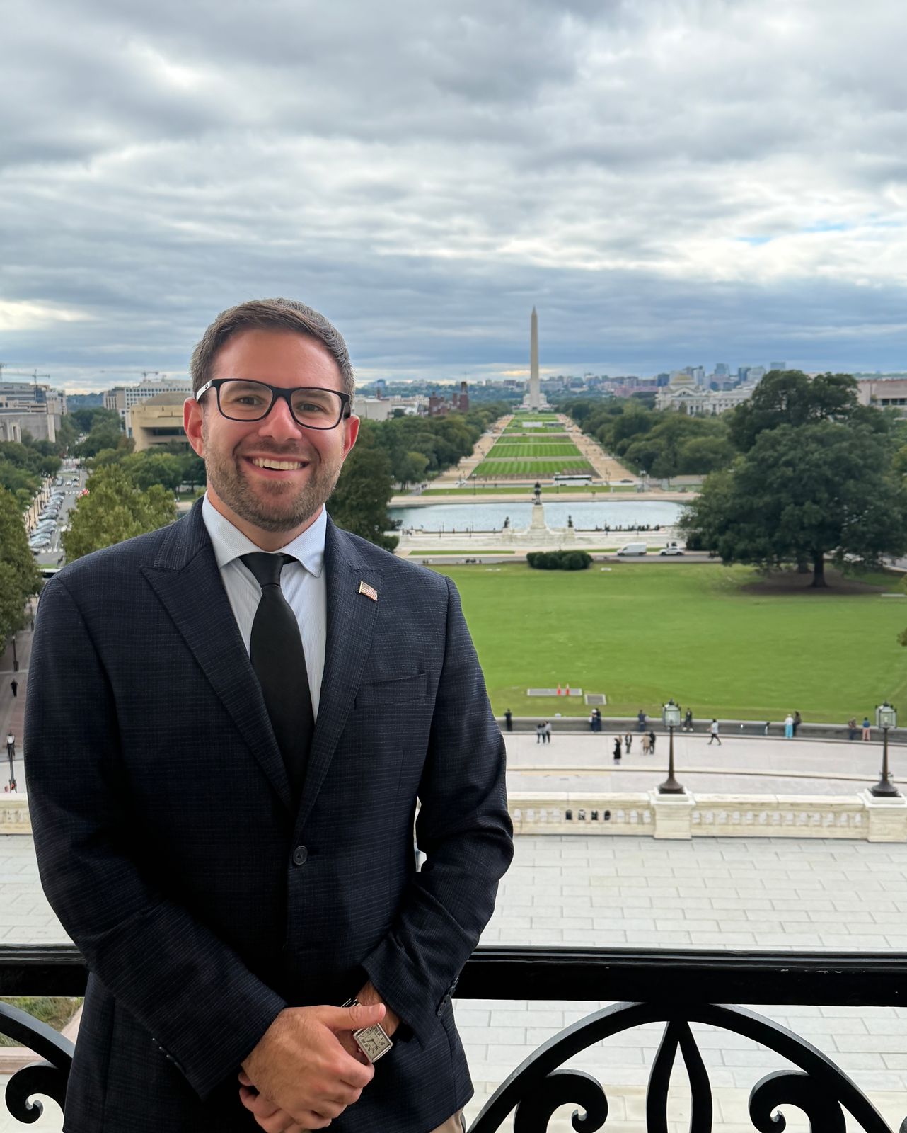 Vince Nowicki on a balcony overlooking the National Mall in Washington, D.C.